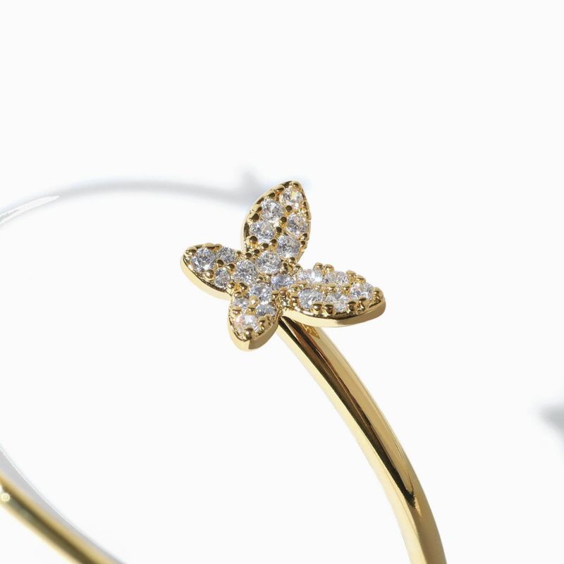 ANNE KLEIN バタフライと花のバングル Amazon.co.jp: Anne Klein レディースプレミアムクリスタル